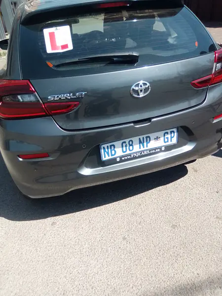 Grey Toyota Starlet, NB 08 NP GP